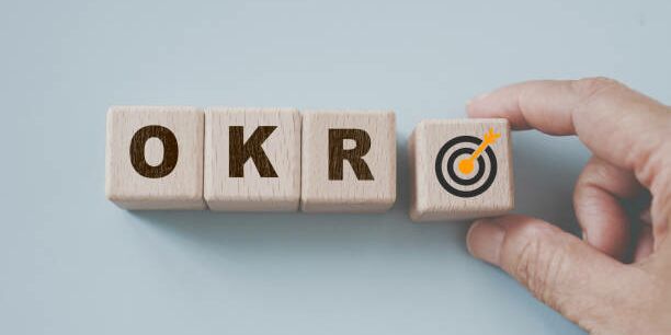 Dés représentant les mots OKR