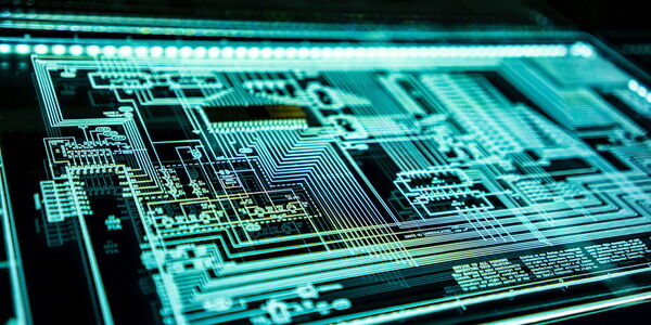 Photo : Une plaque lumineuse reprenant un système technique complexe